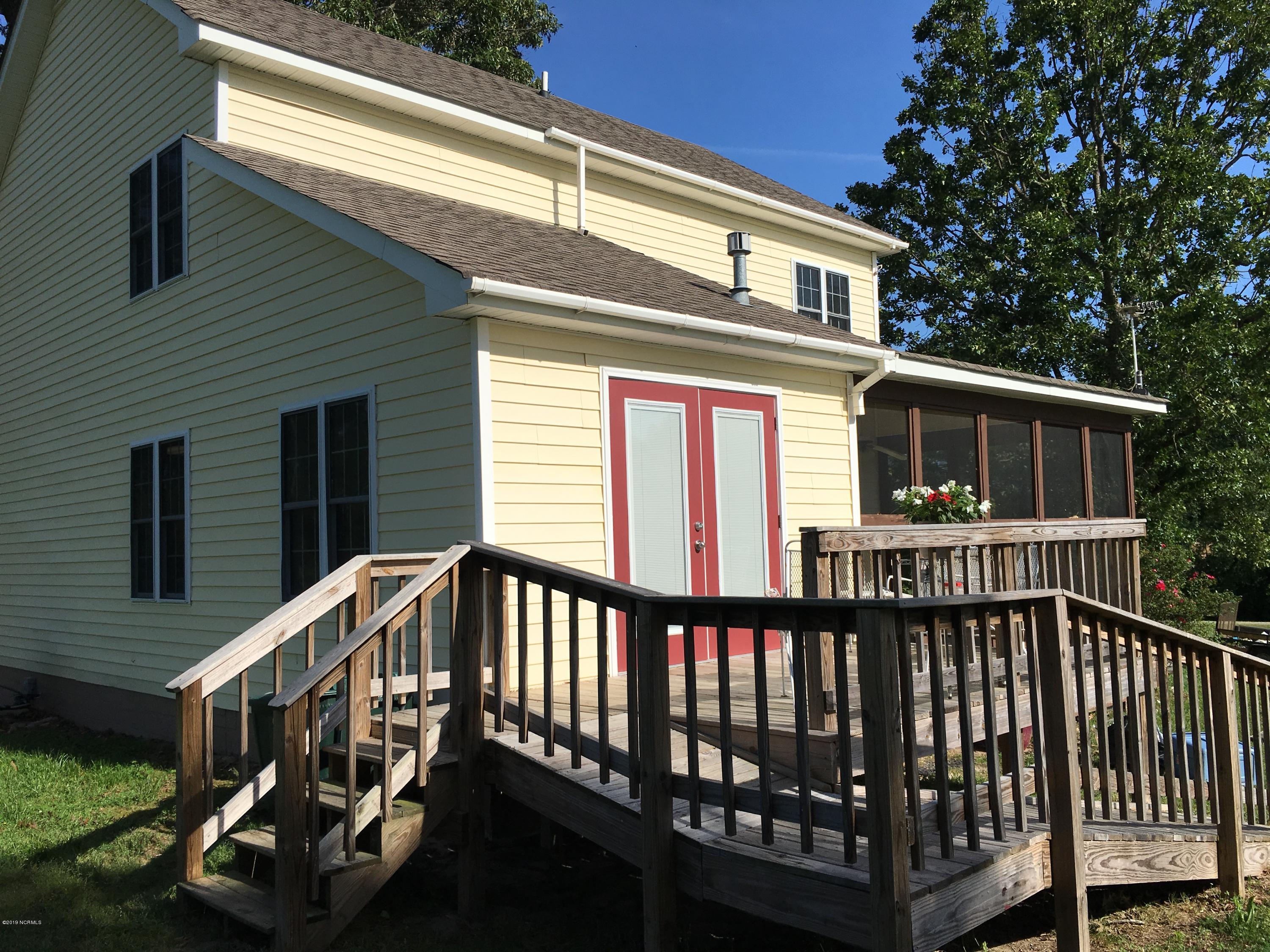 4958 St Rose Church Road Sims, NC 27880 - Photo 21 of 22 Deck leading into den has handicap ramp