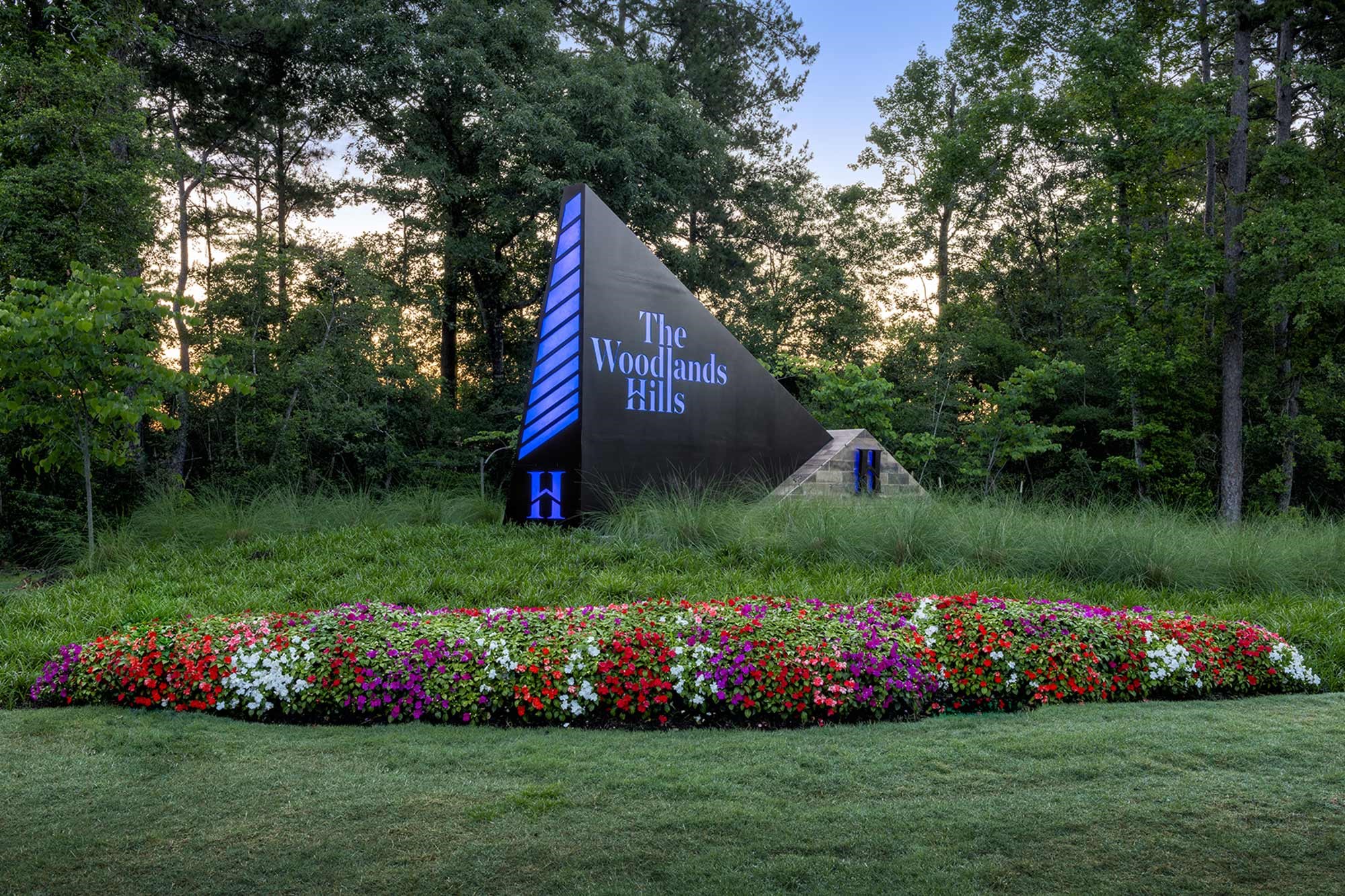 235 Painters Ridge Court Willis, TX 77318 - Photo 12 of 19 a view of a garden and flowers