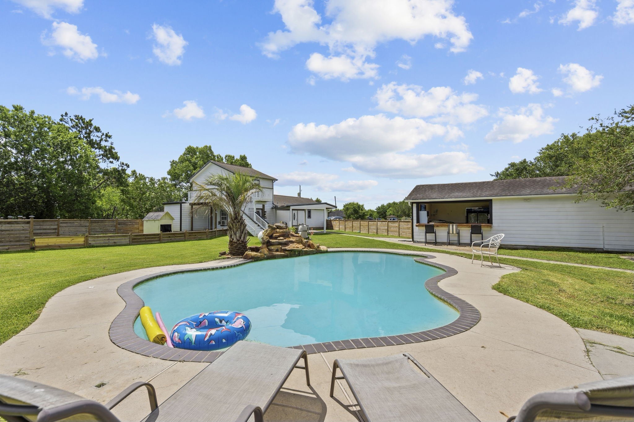 7009 Avenue R Santa Fe, TX 77510 - Photo 31 of 48 Just hang out by the pool!