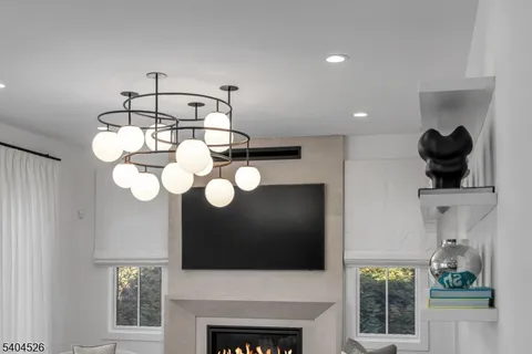 a bathroom with a sink shower and a mirror