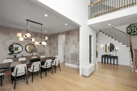 a living room with furniture fireplace and flat screen tv