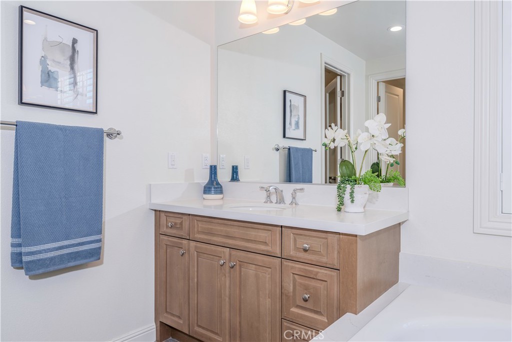 11 Barberry Lake Forest, CA 92630 - Photo 33 of 64 a bathroom with a sink and a mirror