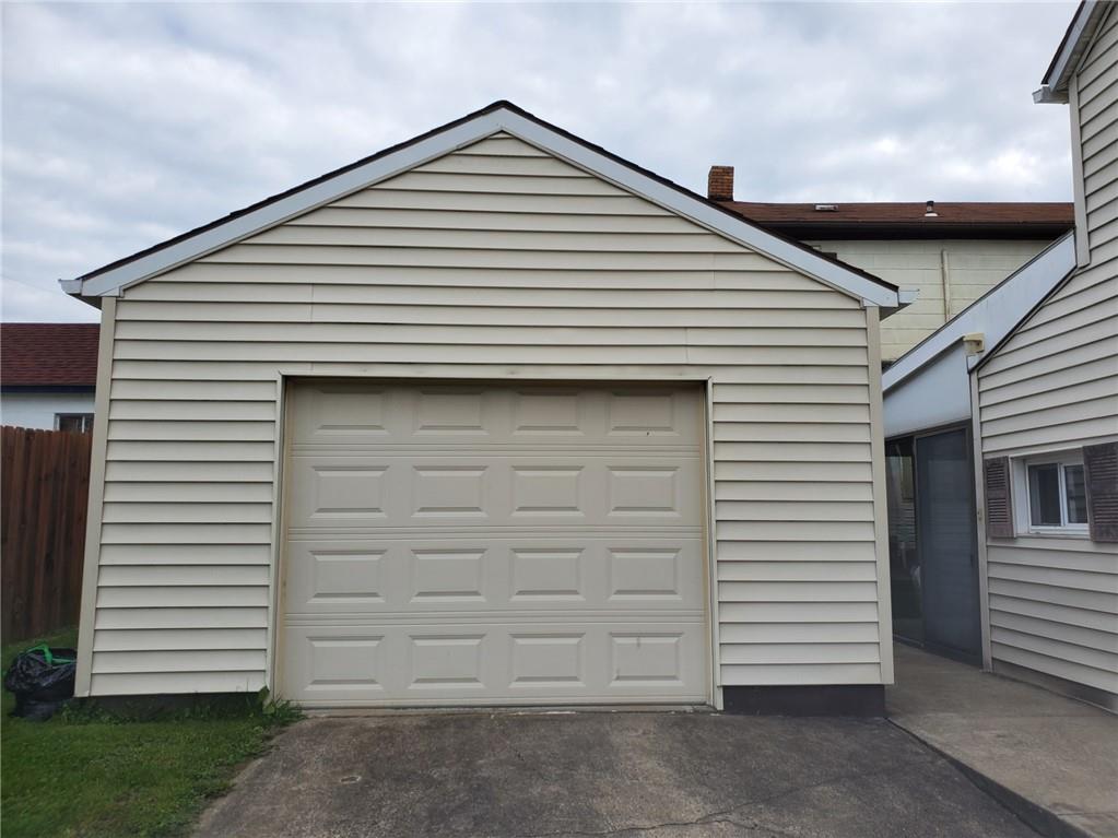 452 Jefferson Street Rochester, PA 15074 - Photo 2 of 18 a view of a house with a garage
