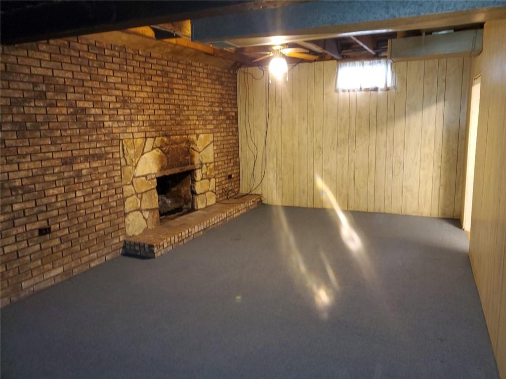 452 Jefferson Street Rochester, PA 15074 - Photo 12 of 18 a view of a room with wooden walls