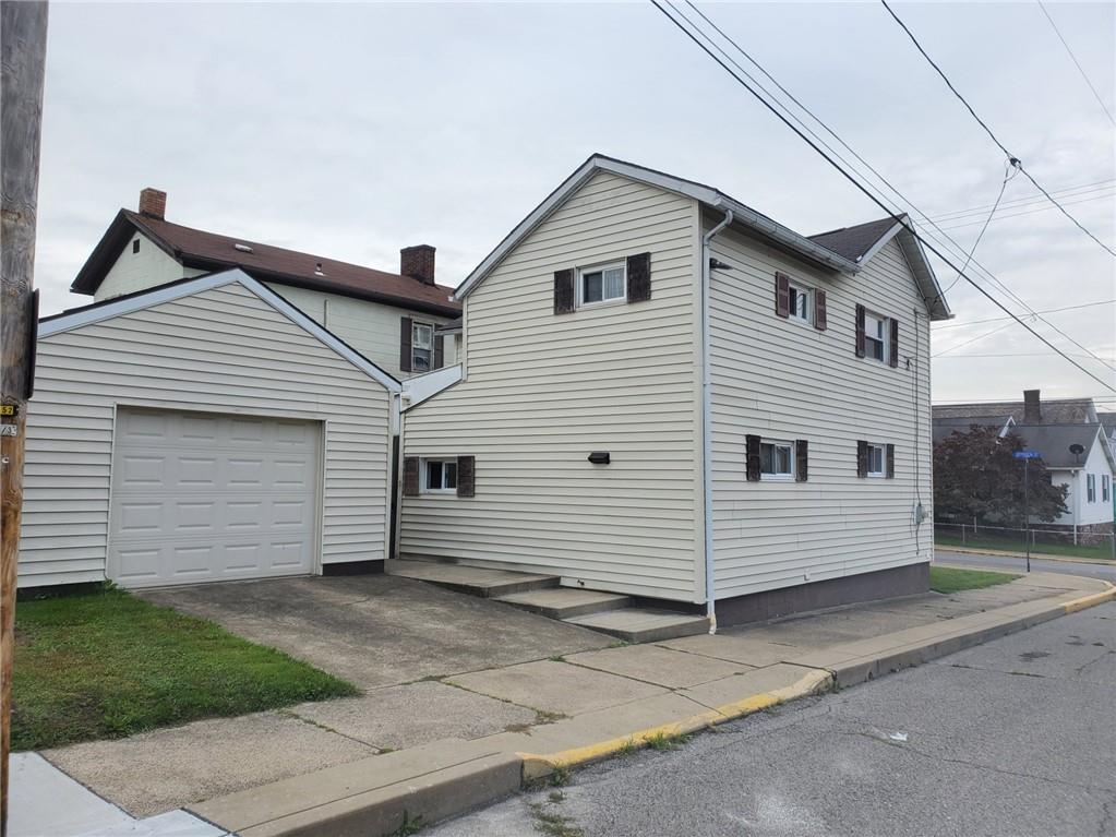 452 Jefferson Street Rochester, PA 15074 - Photo 3 of 18 a view of a white house