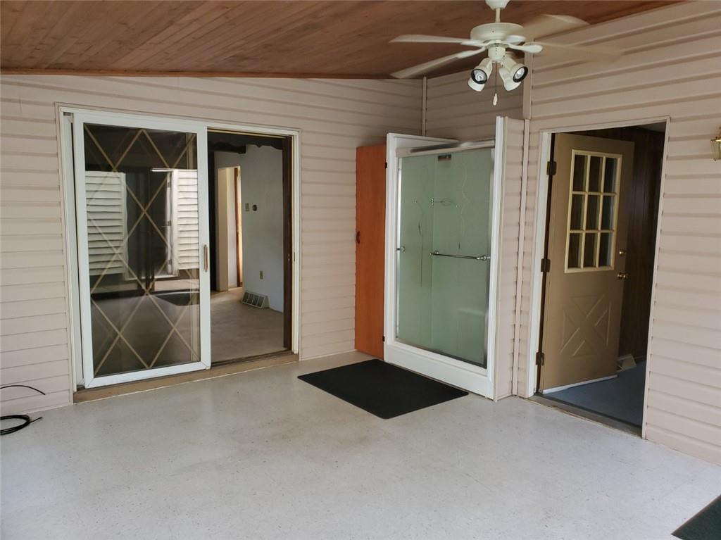 452 Jefferson Street Rochester, PA 15074 - Photo 9 of 18 an empty room with fan and entrance