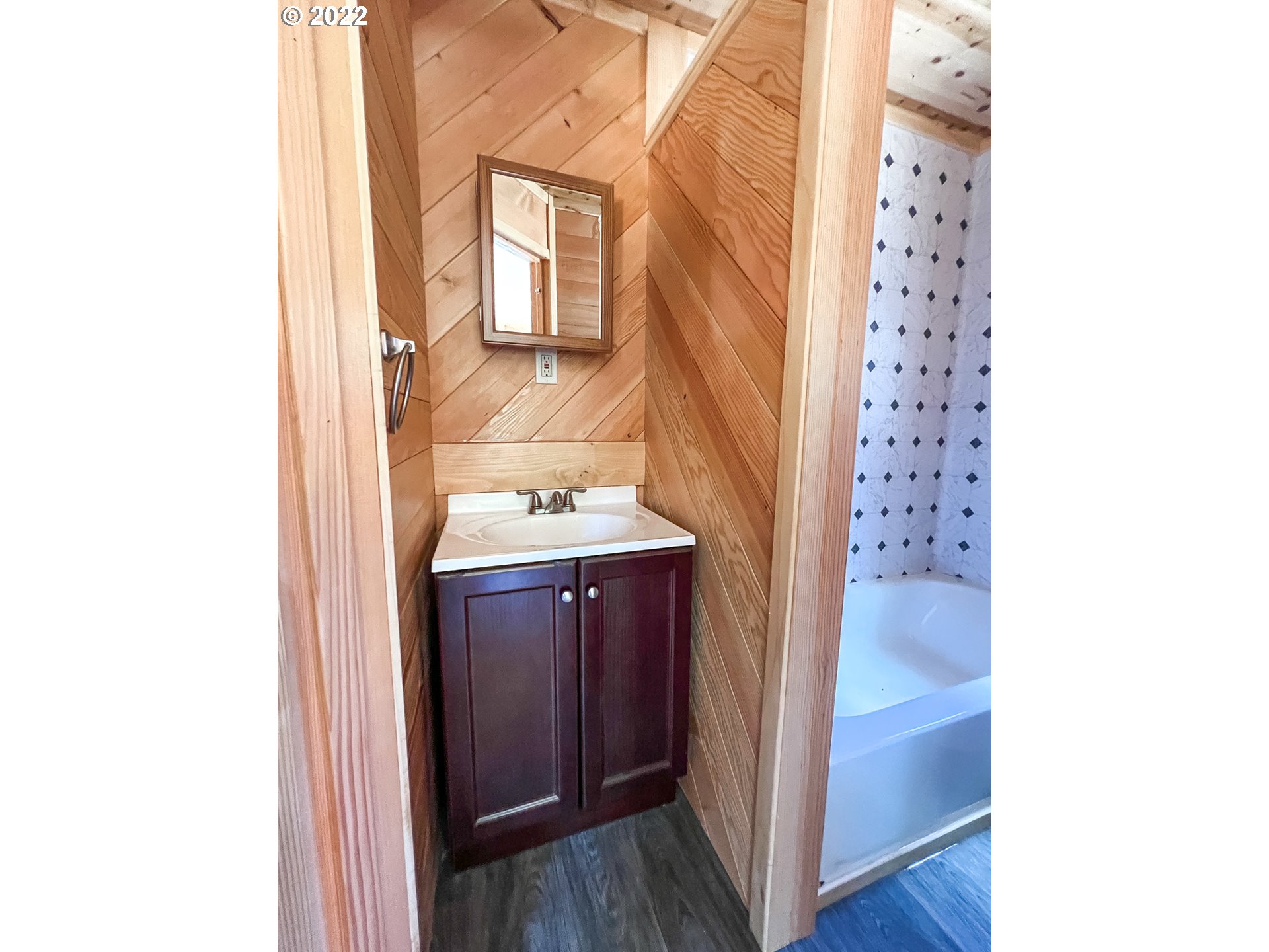 0 Bridge Tiny Home Myrtlepoint Or 97458 Myrtle Point, OR 97458 - Photo 12 of 18 a bathroom with a sink and a mirror