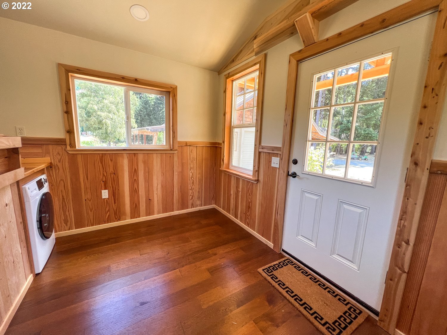 0 Bridge Tiny Home Myrtlepoint Or 97458 Myrtle Point, OR 97458 - Photo 15 of 18 a view of an empty room with a window and wooden floor
