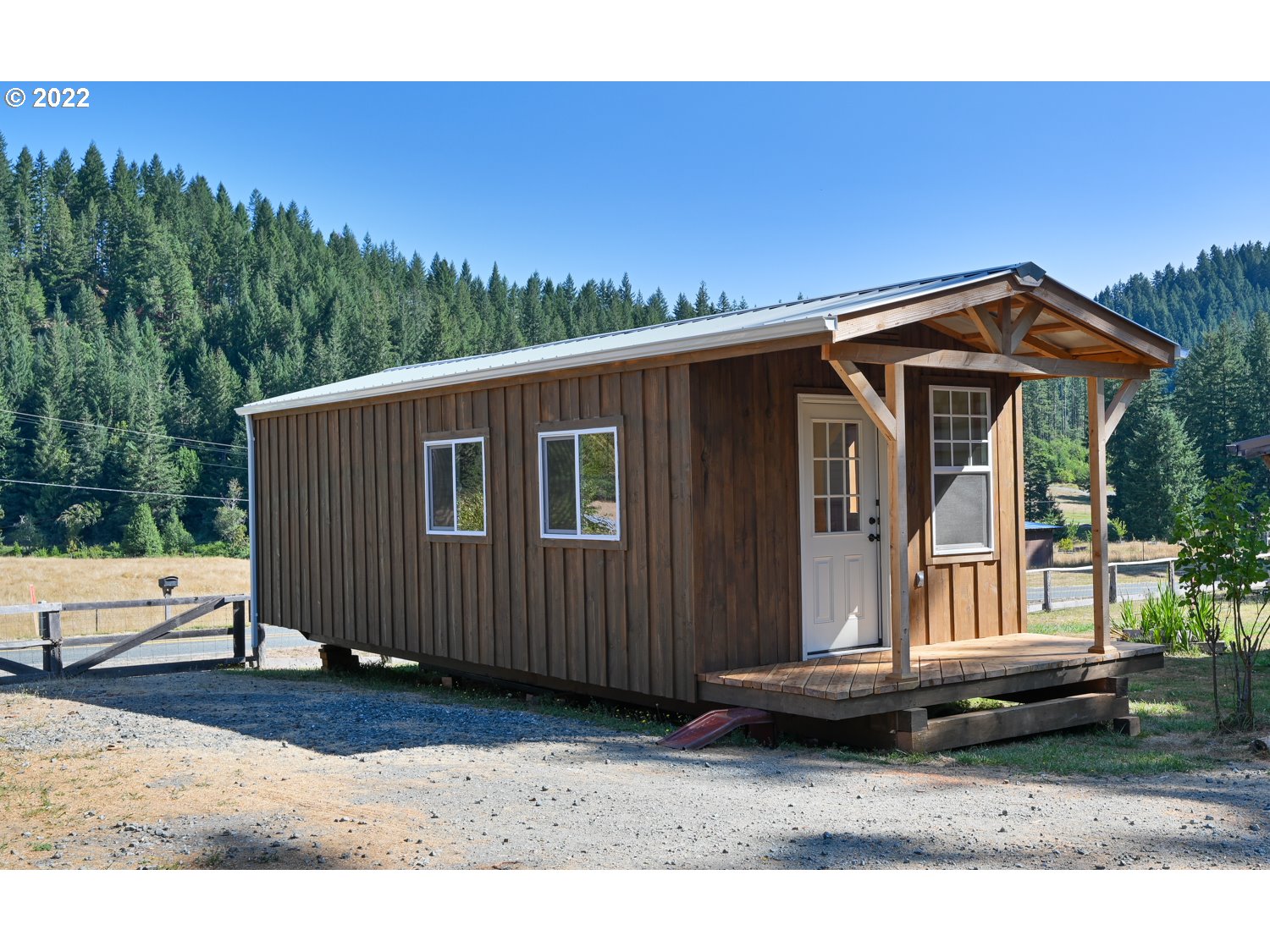 0 Bridge Tiny Home Myrtlepoint Or 97458 Myrtle Point, OR 97458 - Photo 17 of 18 a view of a house with a yard