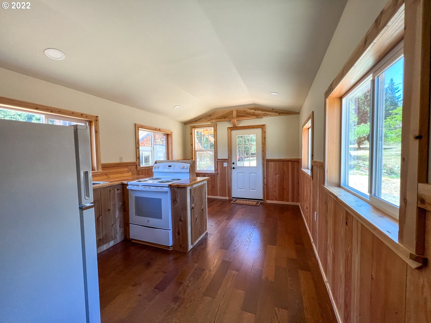 0 Bridge Tiny Home Myrtlepoint Or 97458 Myrtle Point, OR 97458 - Photo 2 of 18 a view of a livingroom with furniture hardwood floor and windows