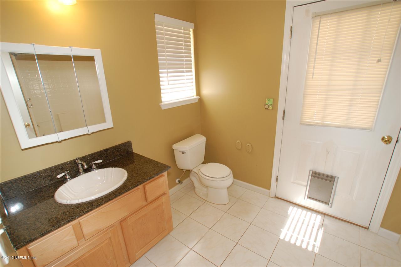 136 Old Hard Road Fleming Island, FL 32003 - Photo 20 of 35 Bathroom #2 that leads to lanai.
