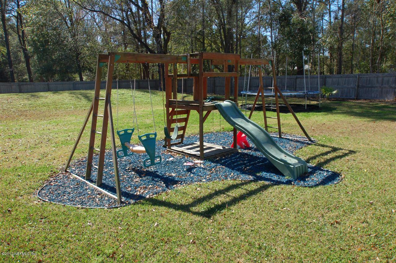 136 Old Hard Road Fleming Island, FL 32003 - Photo 31 of 35 Play Gym and Trampoline