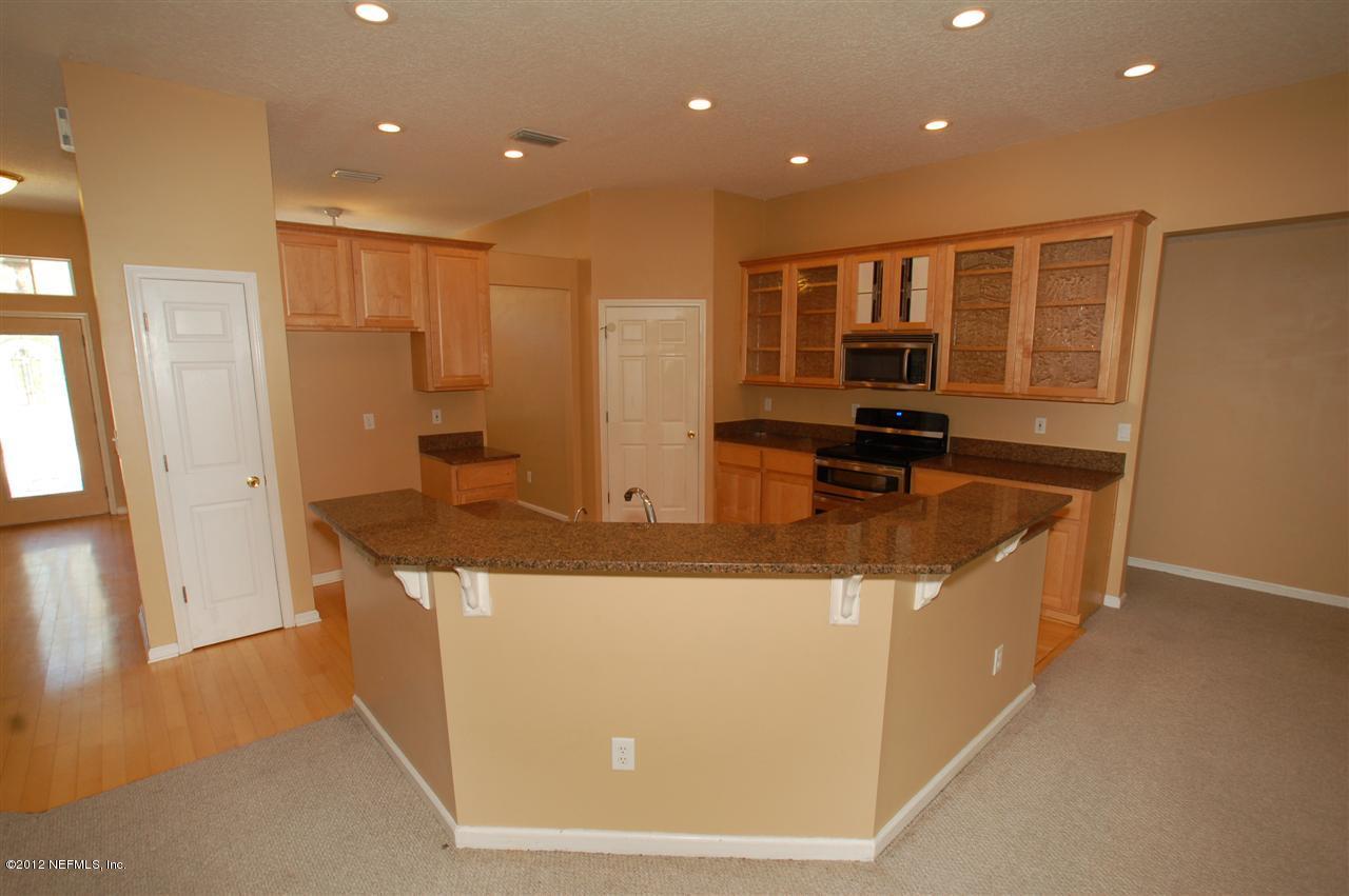 136 Old Hard Road Fleming Island, FL 32003 - Photo 9 of 35 Kitchen with Granite Counters