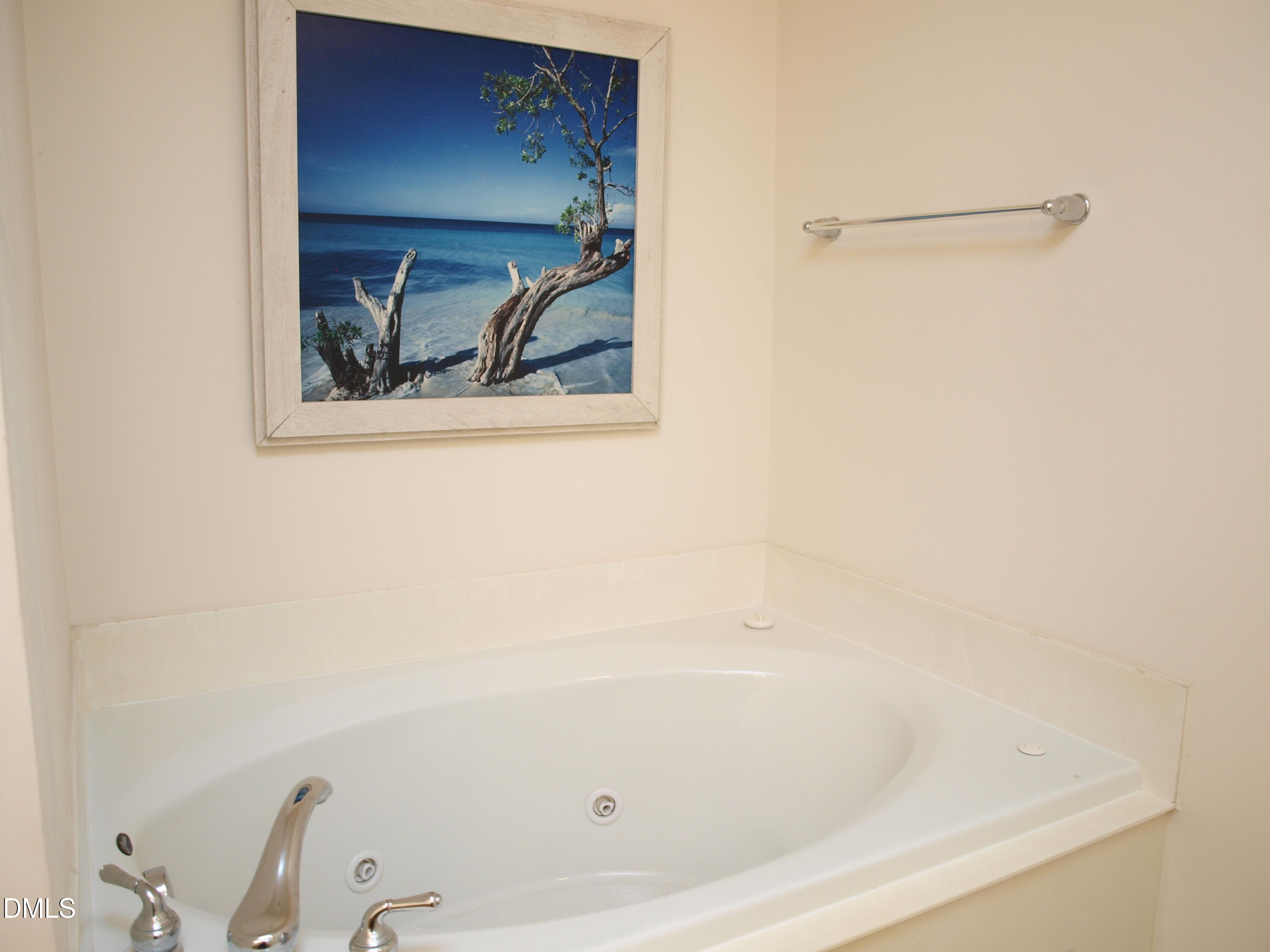 5206 Rio Grande Drive Raleigh, NC 27616 - Photo 24 of 37 a bathroom with a tub
