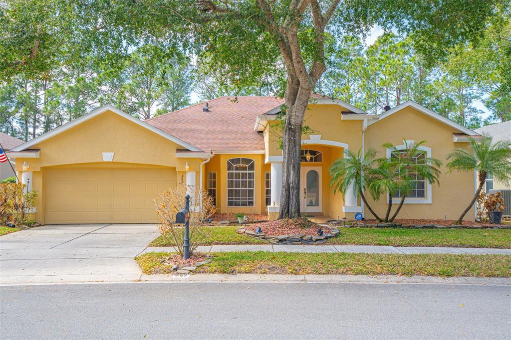 269 Randon Terrace Lake Mary, FL 32746 - Photo 1 of 1 a front view of a house with a yard and garage