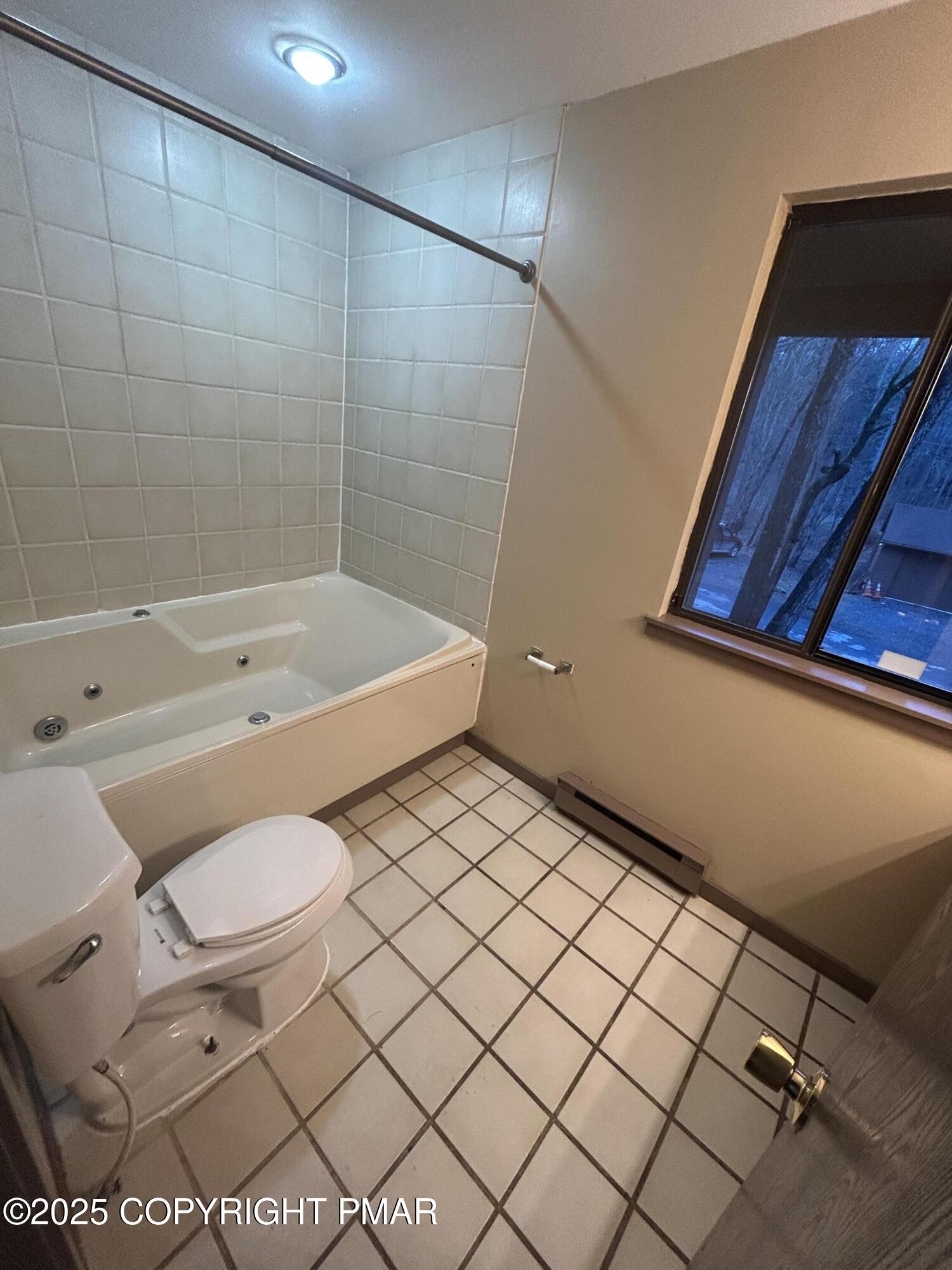 233 Sedburgh Court Bushkill, PA 18324 - Photo 4 of 14 a bathroom with a sink a toilet and shower