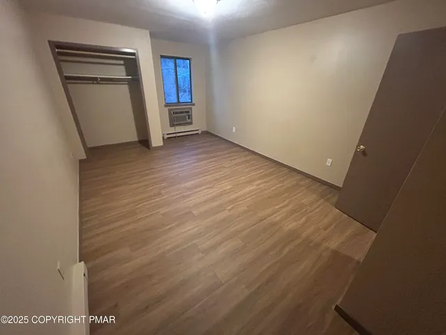 an empty room with closet