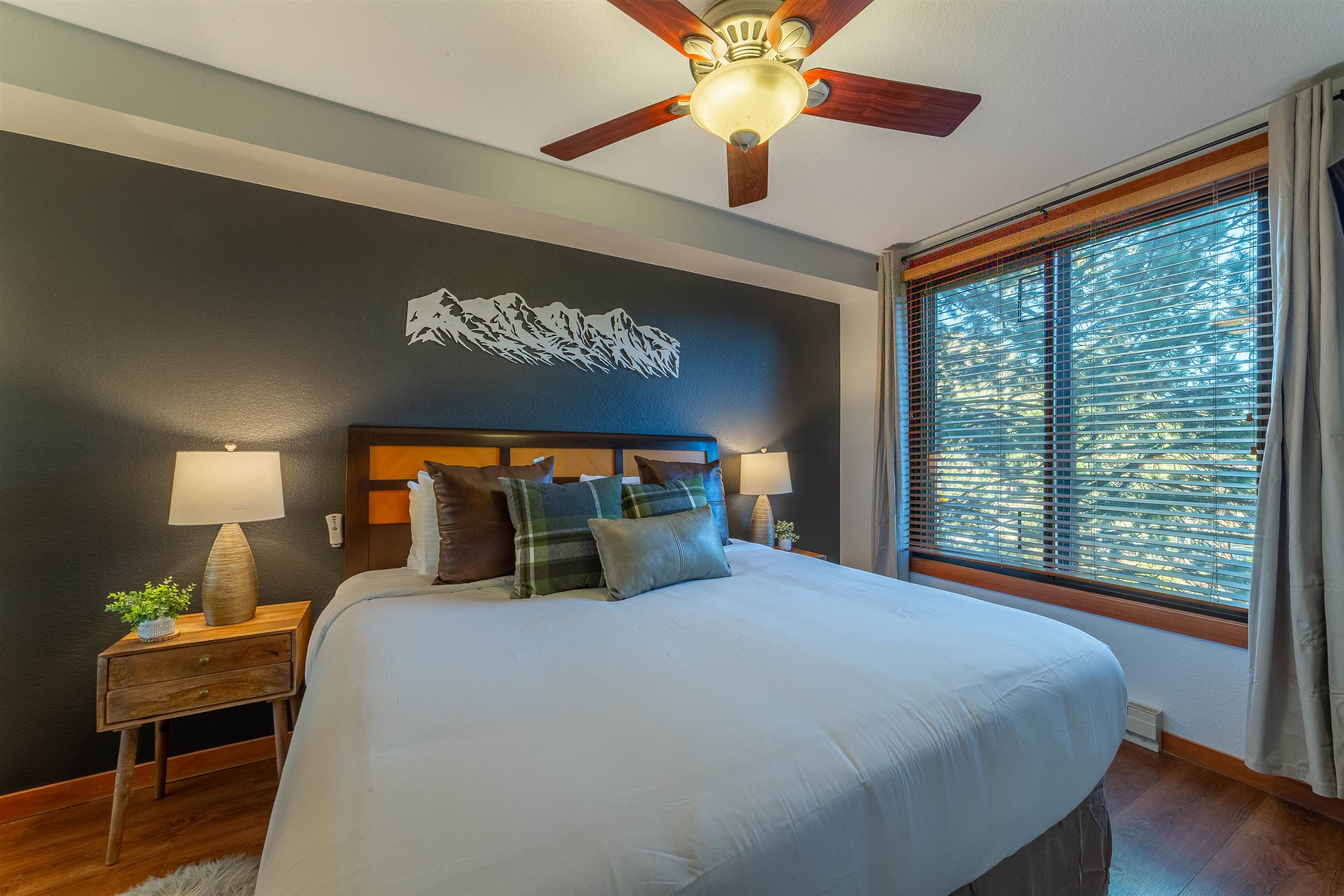 6201 Minaret Road, Unit 2221 Mammoth Lakes, CA 93546 - Photo 32 of 44 Wood-finish flooring with a wide window featuring horizontal blinds