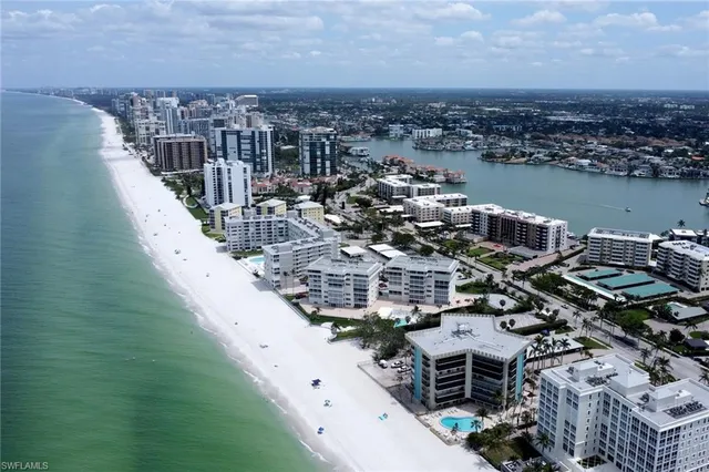 an aerial view of a house with outdoor space