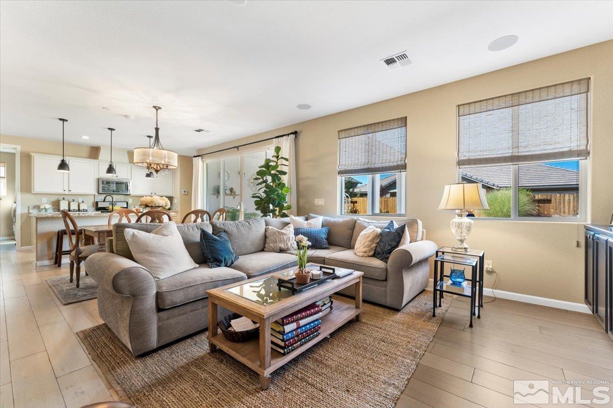 2315 Trakehner Lane Reno, NV 89521 - Photo 11 of 40 a living room with furniture large window and a table