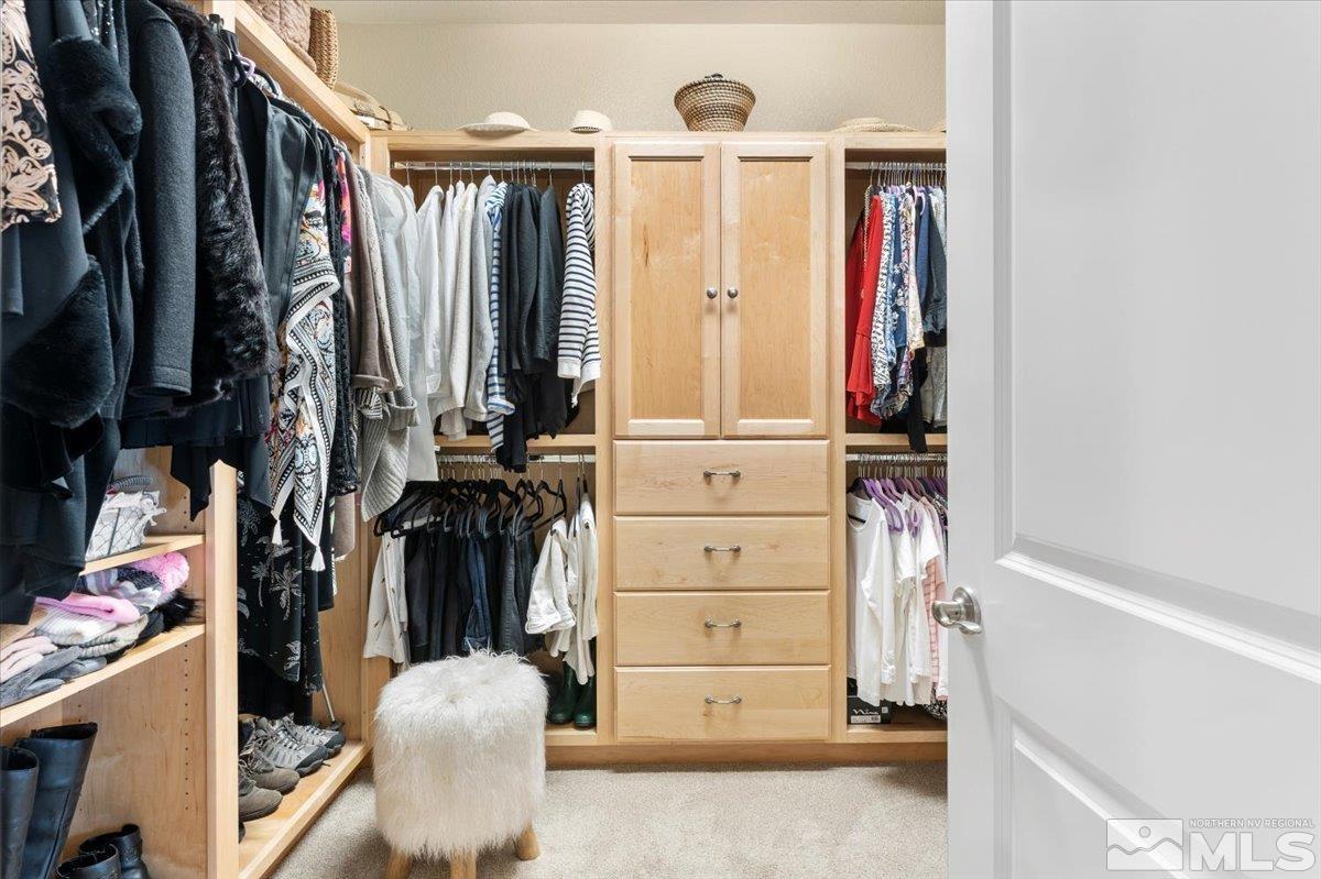 2315 Trakehner Lane Reno, NV 89521 - Photo 19 of 40 a view of walk in closet with clothes and shoes