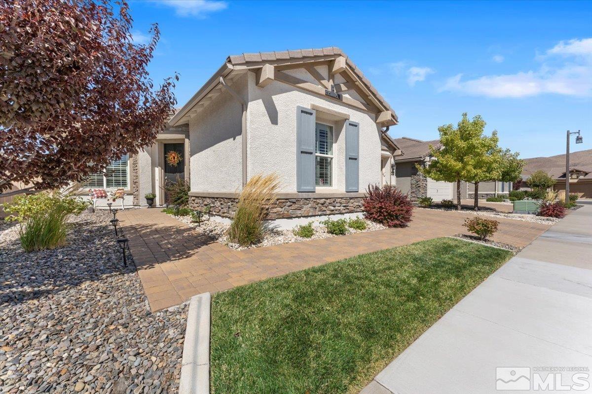 2315 Trakehner Lane Reno, NV 89521 - Photo 2 of 40 a front view of a house with a yard
