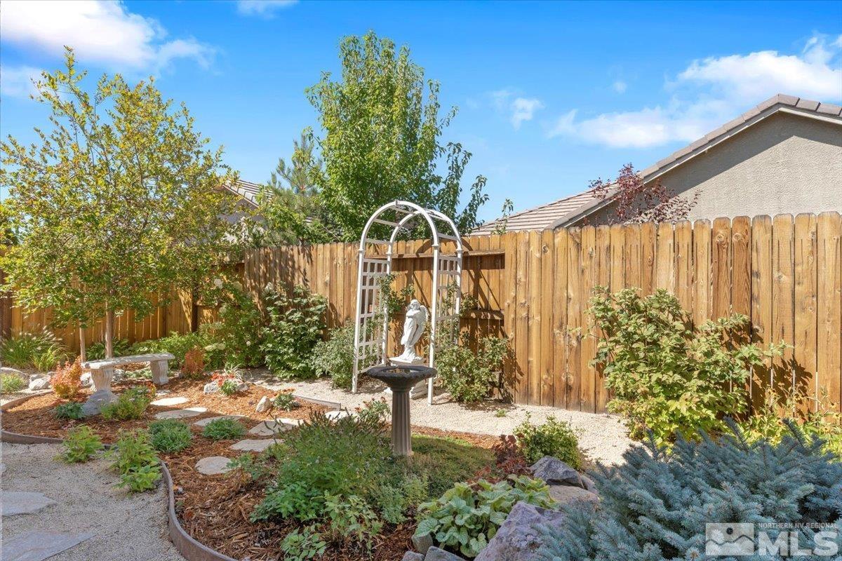 2315 Trakehner Lane Reno, NV 89521 - Photo 27 of 40 a front view of a house with garden