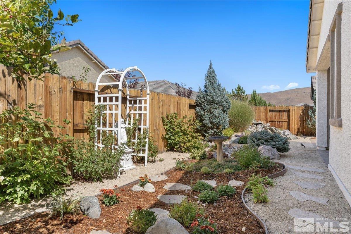 2315 Trakehner Lane Reno, NV 89521 - Photo 28 of 40 a front view of a house with a yard