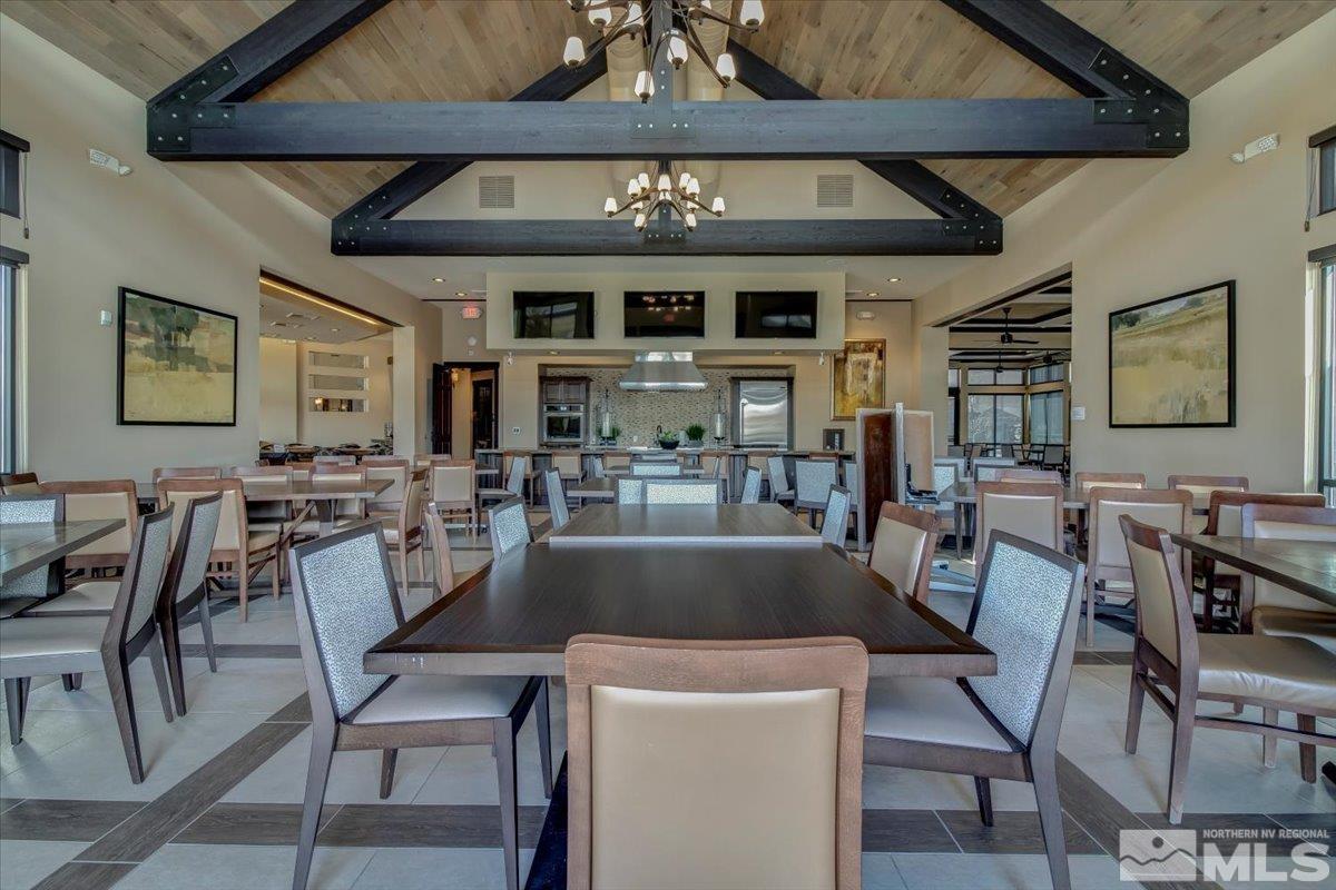 2315 Trakehner Lane Reno, NV 89521 - Photo 40 of 40 a view of a dining room with furniture and chandelier
