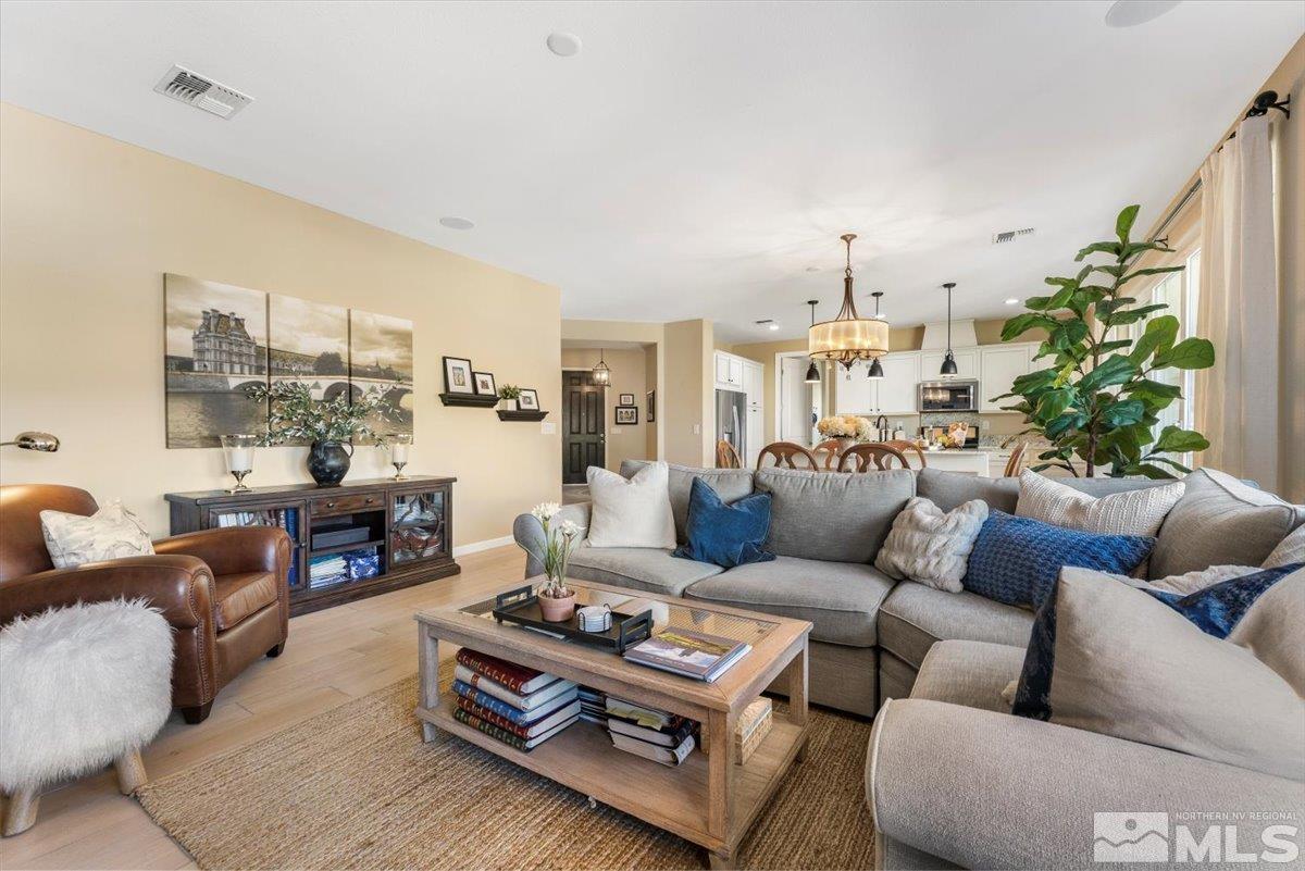 2315 Trakehner Lane Reno, NV 89521 - Photo 10 of 40 a living room with furniture fireplace and a large window