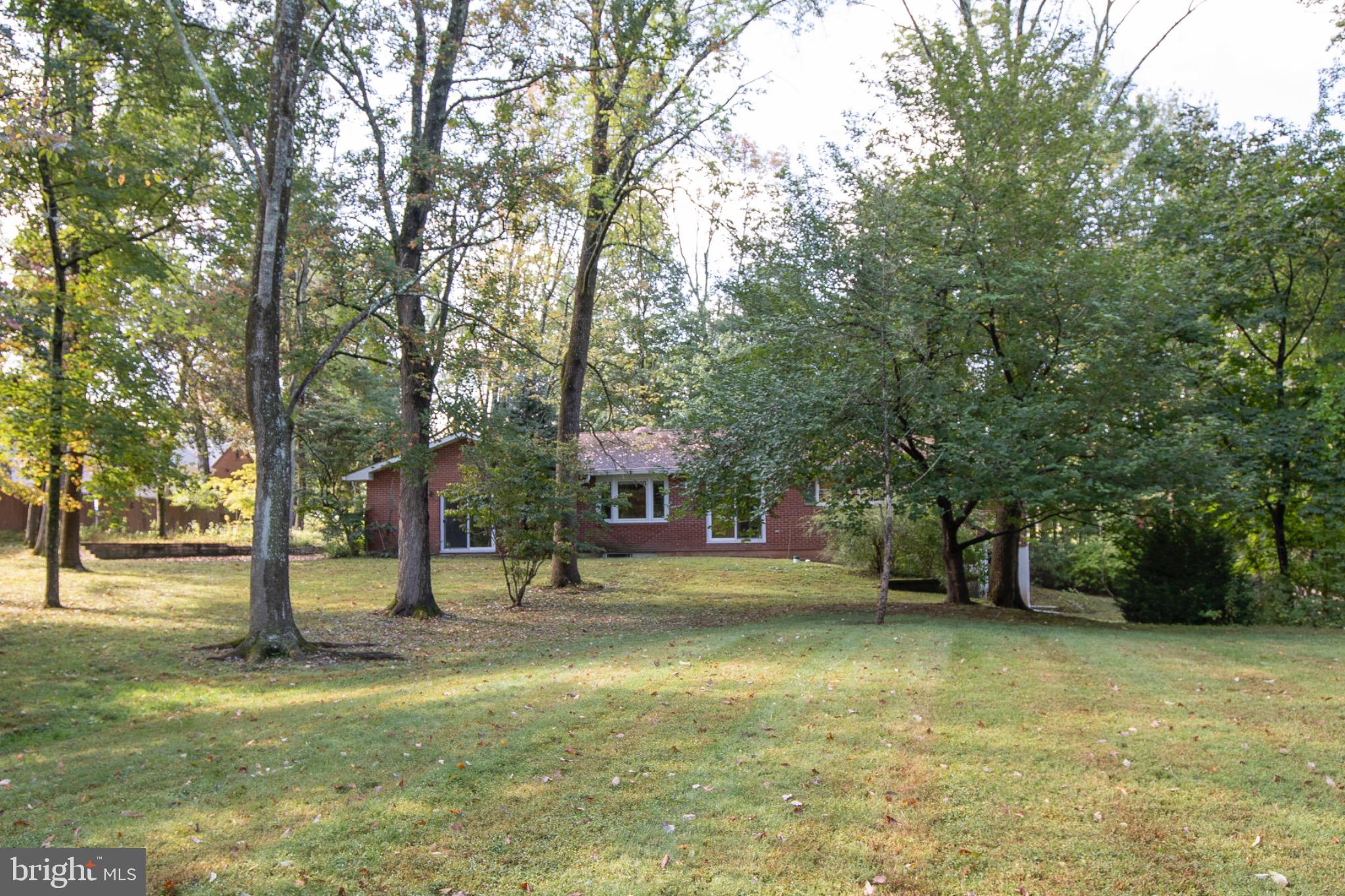 72 Heffner Road Royersford, PA 19468 - Photo 2 of 20 Back of home nestled among lush greenery.