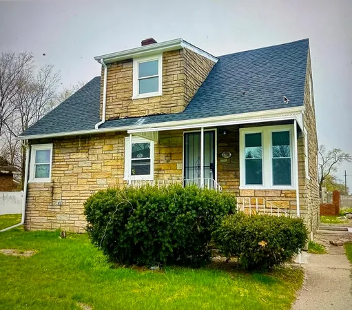 a view of a house with a garden
