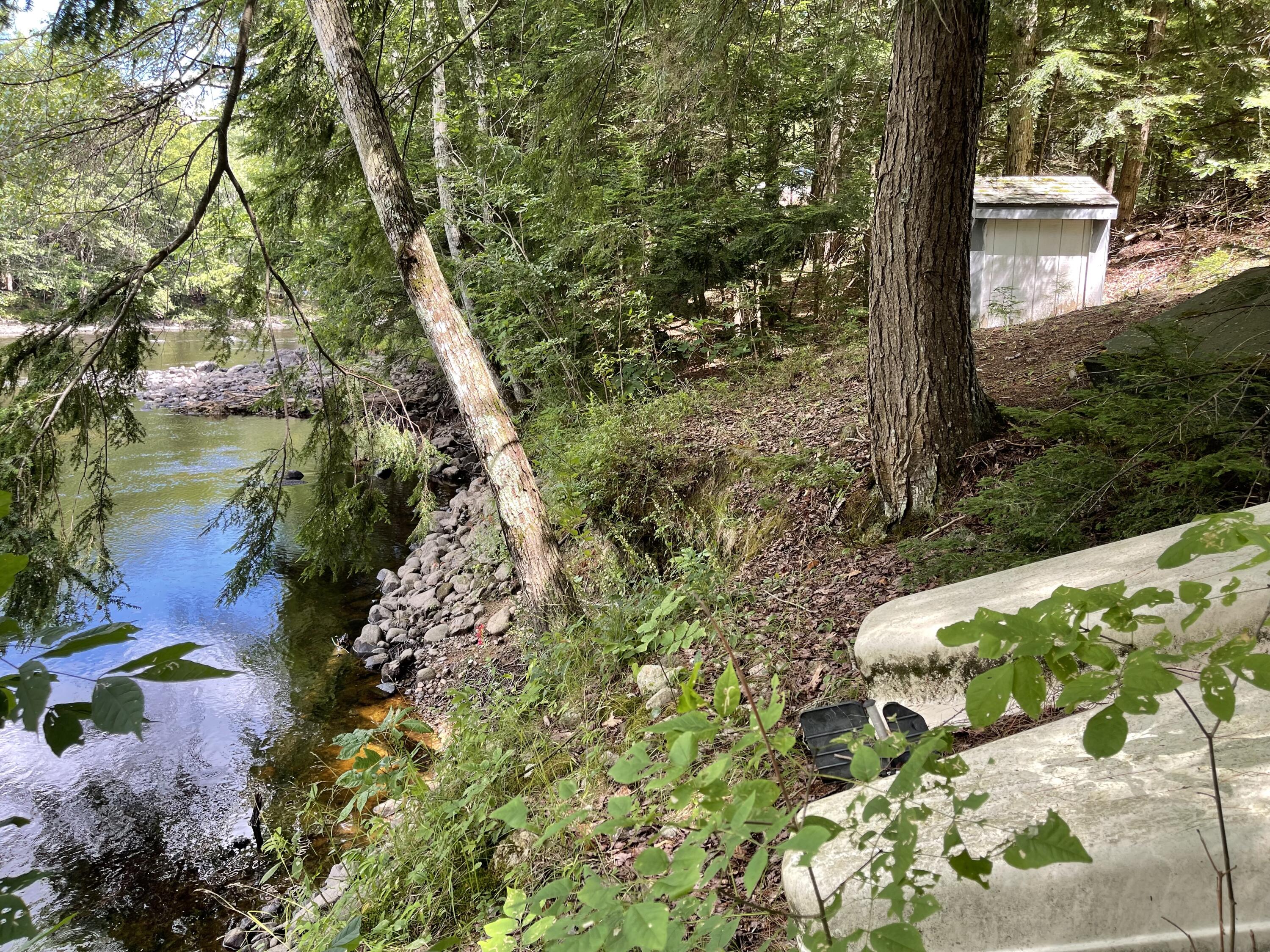 185 Sokokis Road Parsonsfield, ME 04047 - Photo 26 of 26 The well house by the river