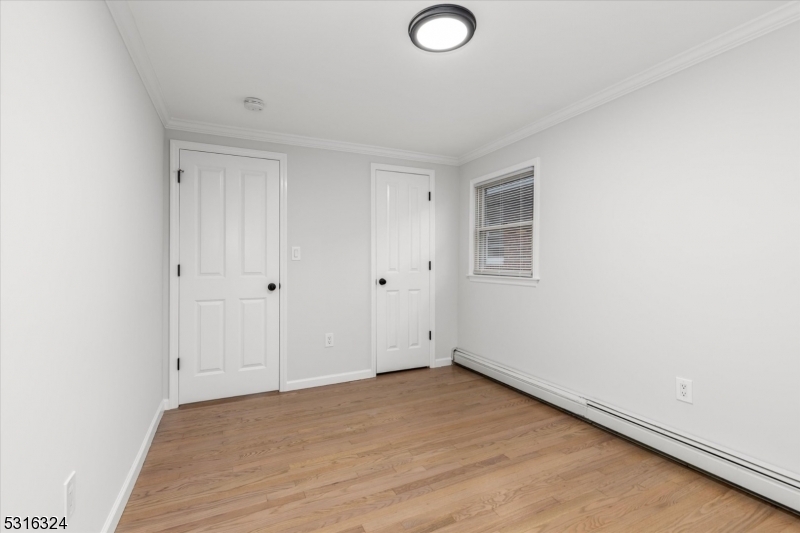 4 Coppola Street Nutley, NJ 07110 - Photo 13 of 14 a view of empty room with wooden floor
