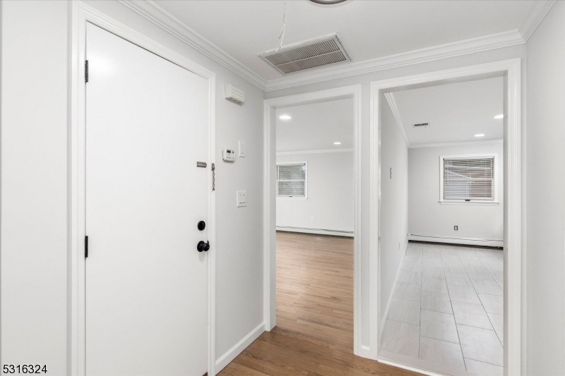 4 Coppola Street Nutley, NJ 07110 - Photo 3 of 14 a view of a bathroom with a shower