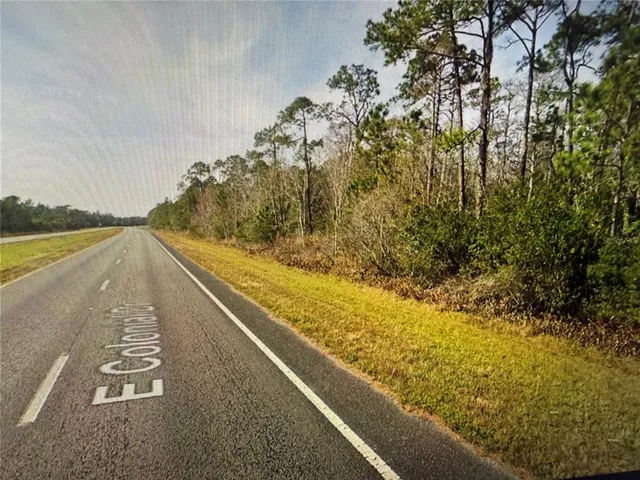a view of a lake from a balcony
