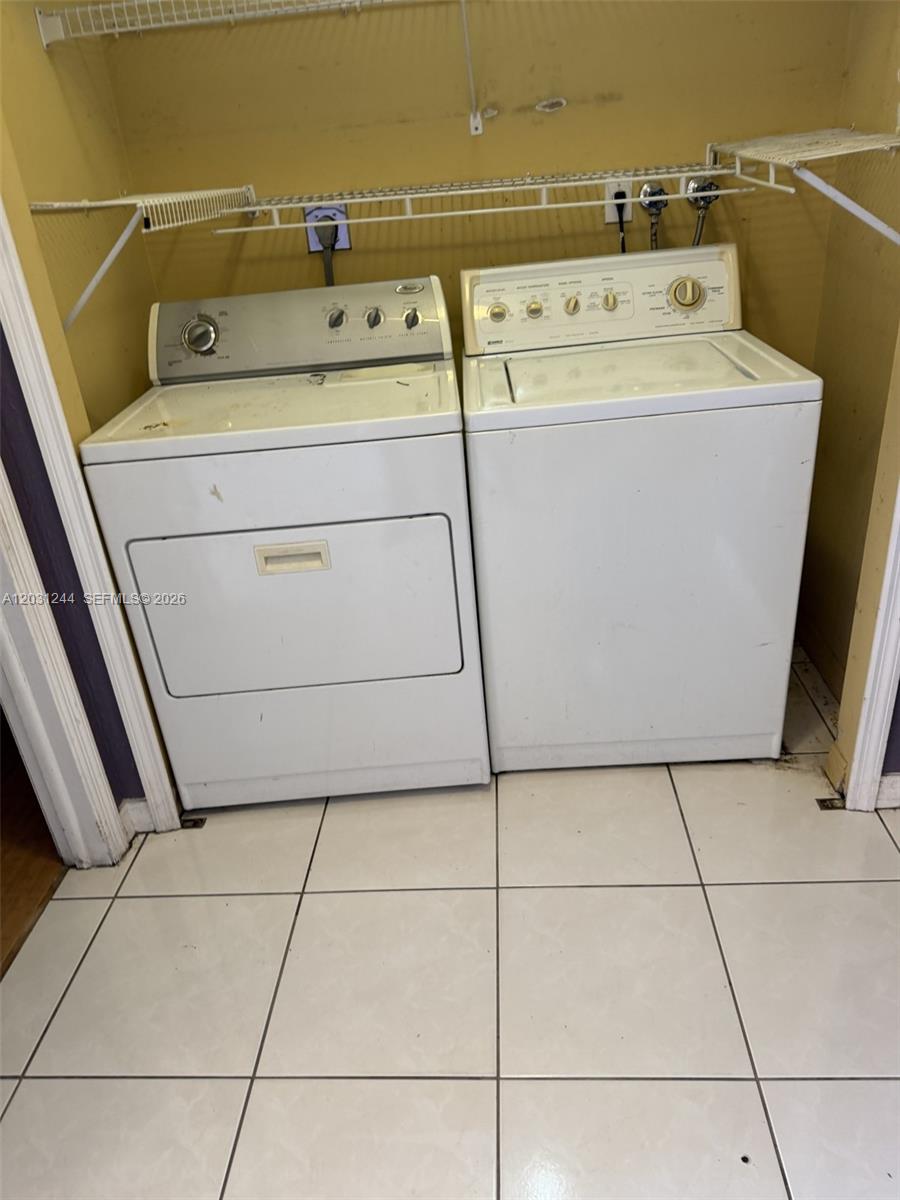 13752 Southwest 156th Street Miami, FL 33177 - Photo 10 of 14 a utility room with dryer and washer