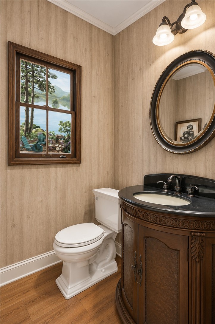 114 Willowbend Drive Anderson, SC 29621 - Photo 44 of 50 This bathroom features a sophisticated vanity and wood-look flooring.