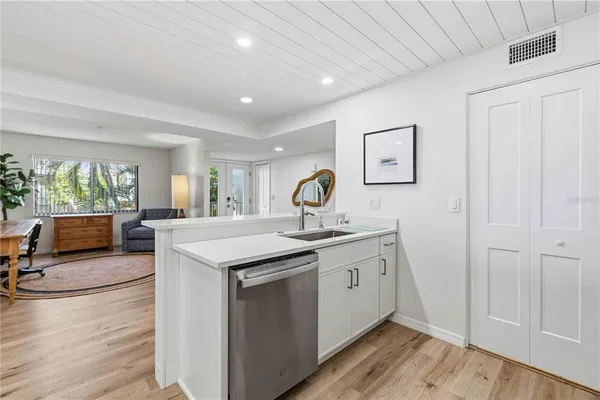 a view of a kitchen from the hallway