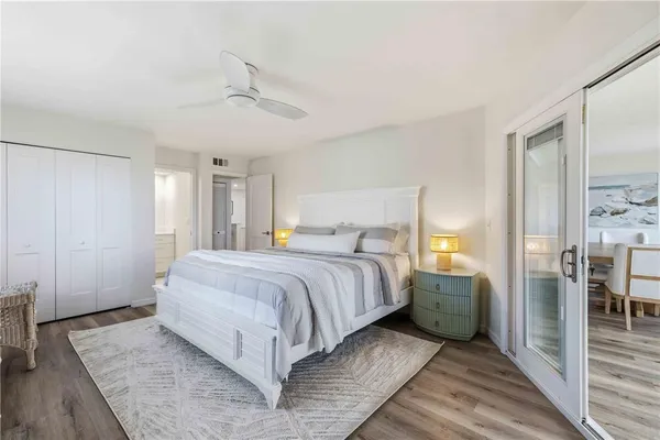 a bed room with a bed and a window