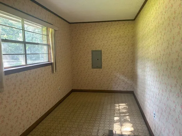 wooden floor and window in a room
