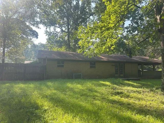 a bathroom with a sink and a shower