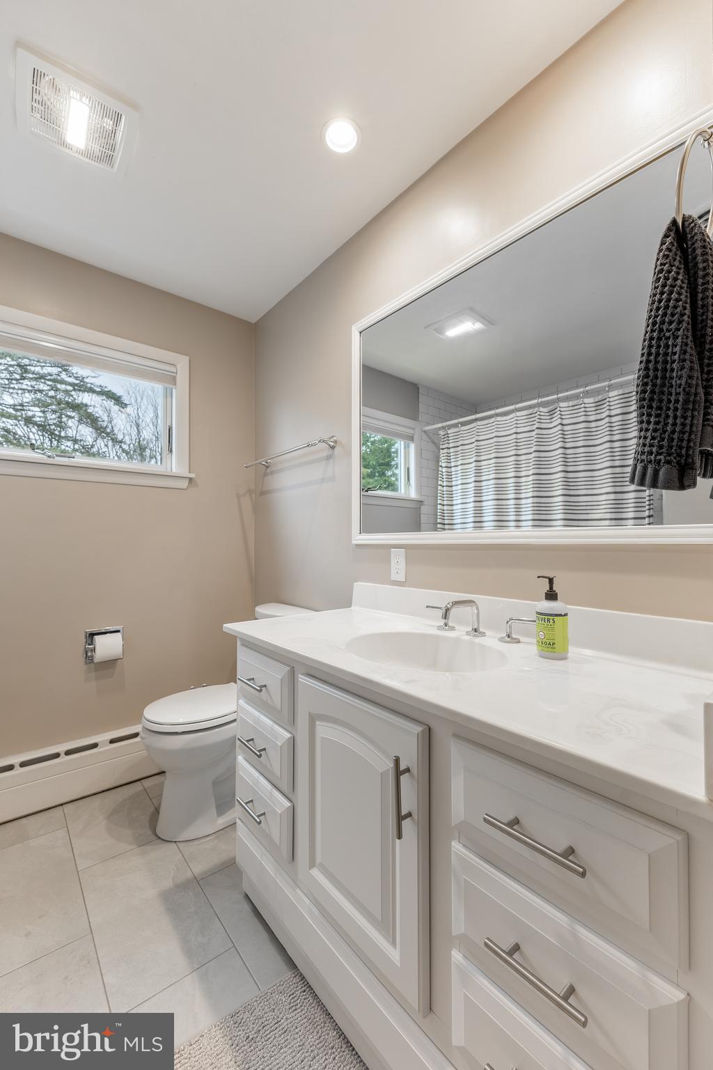 1137 Dorum Avenue State College, PA 16801 - Photo 28 of 56 a bathroom with a toilet sink and mirror