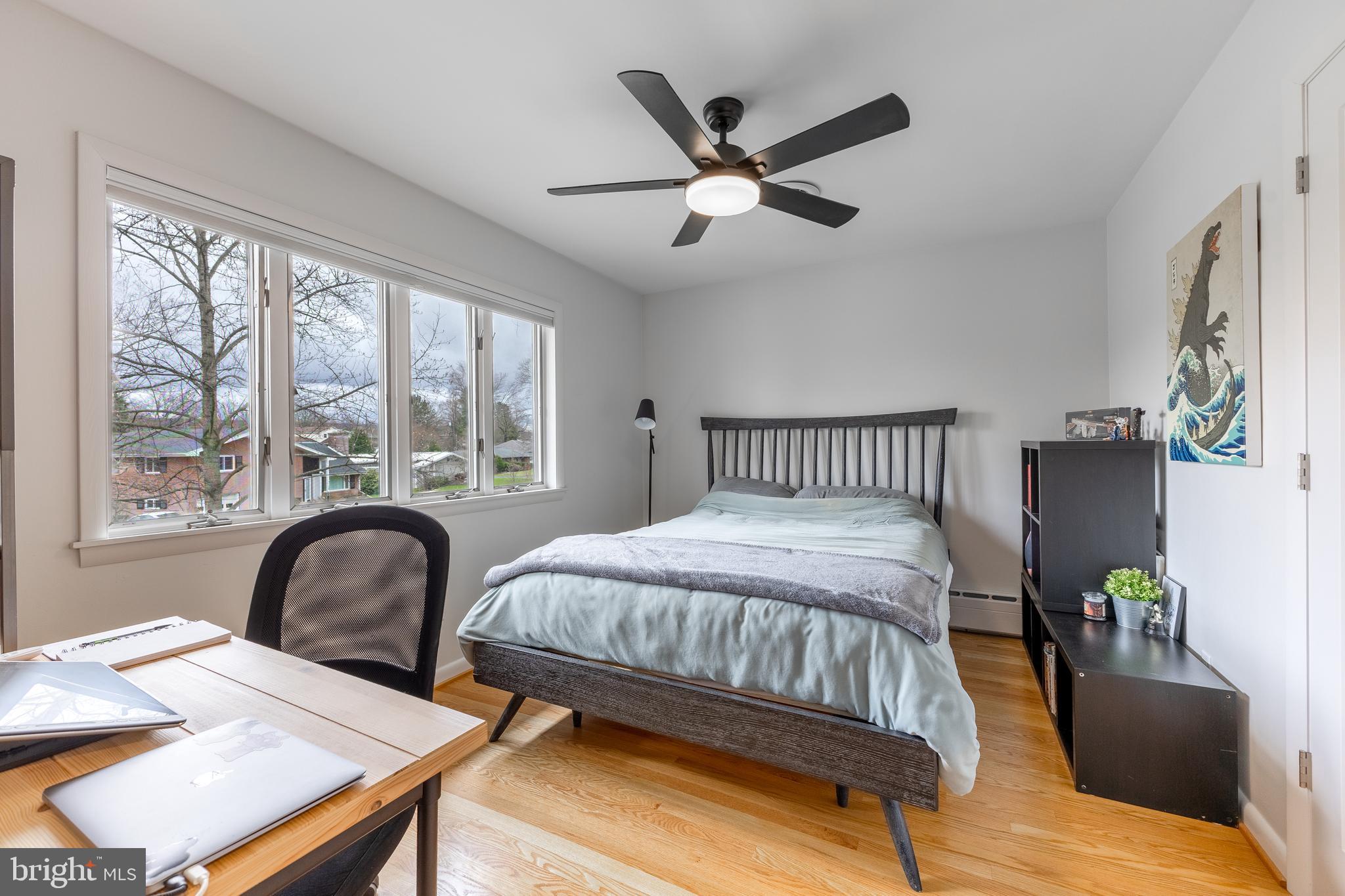 1137 Dorum Avenue State College, PA 16801 - Photo 30 of 56 a bedroom with a bed and wooden floor