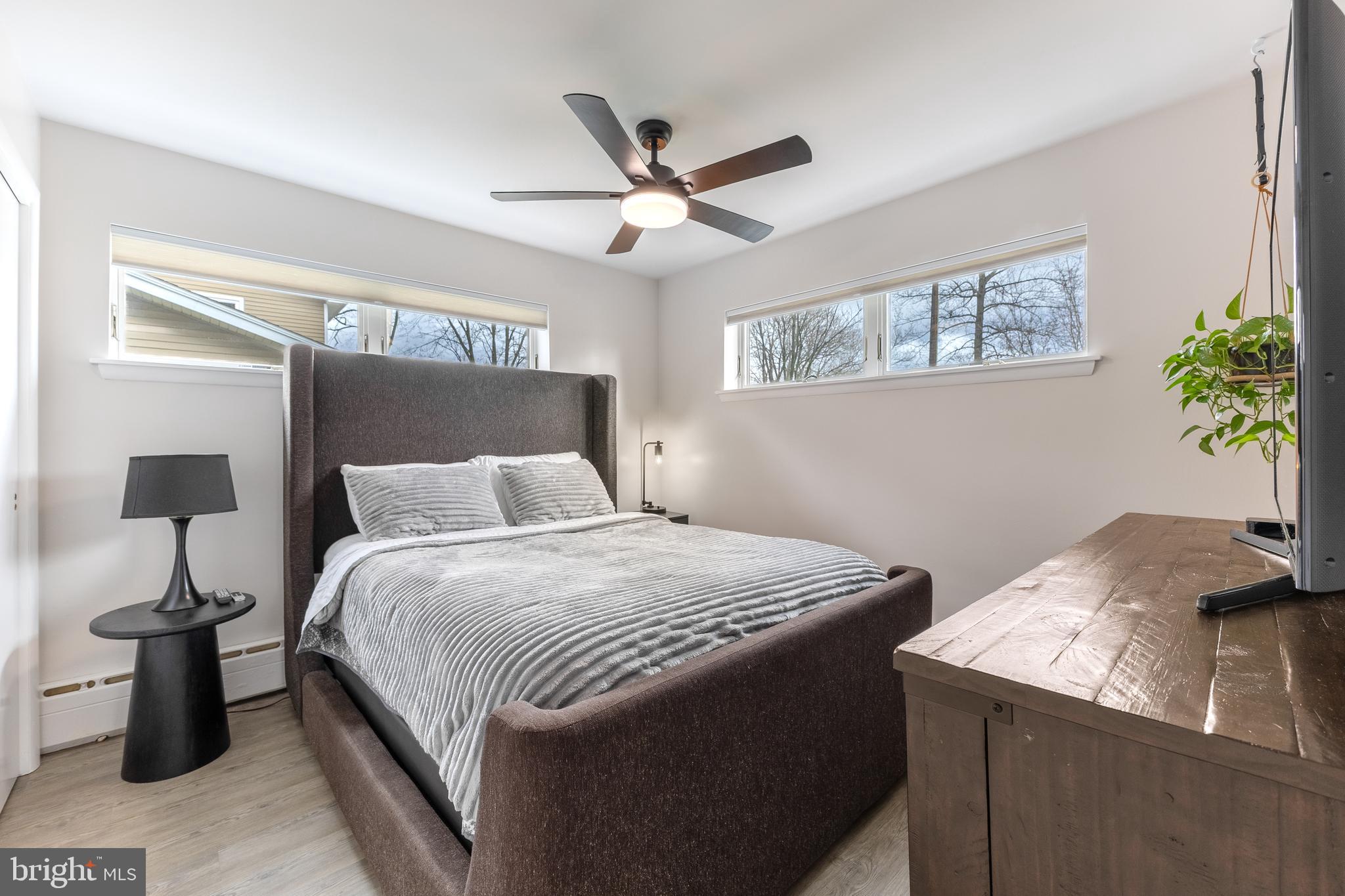 1137 Dorum Avenue State College, PA 16801 - Photo 47 of 56 a bedroom with a bed and a chandelier