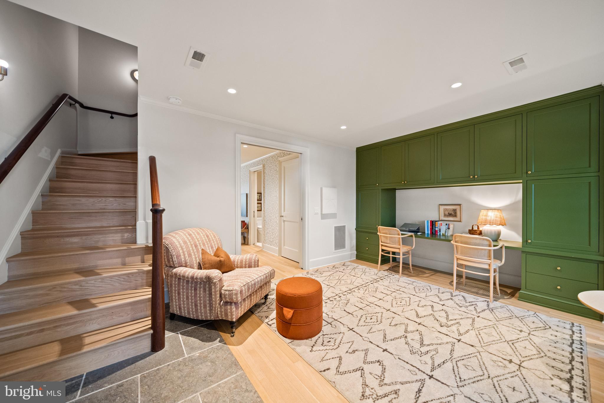 1304 S Street Northwest Washington, DC 20009 - Photo 19 of 23 a living room with furniture and a potted plant