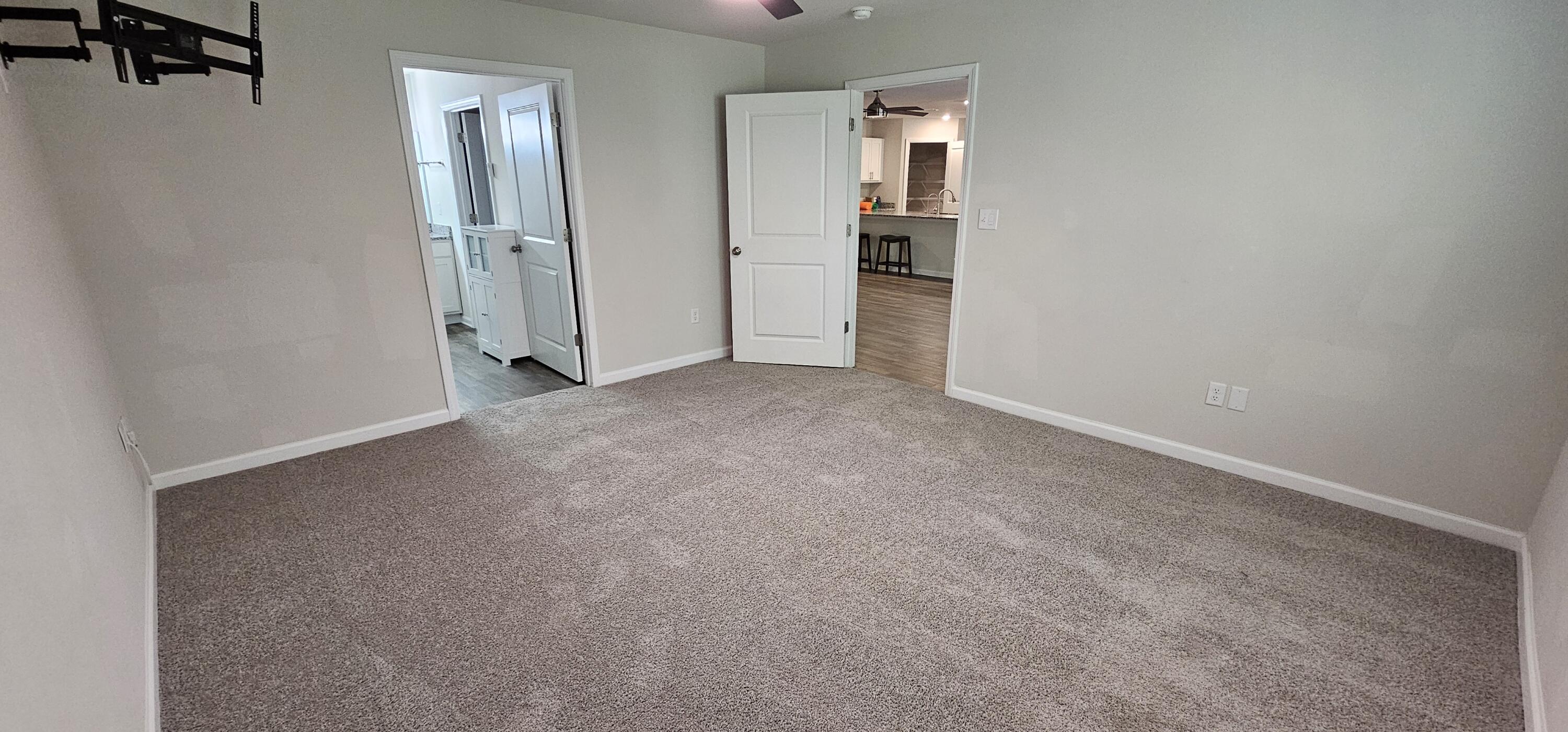 460 Riverwalk Circle Freeport, FL 32439 - Photo 10 of 25 an empty room with closet