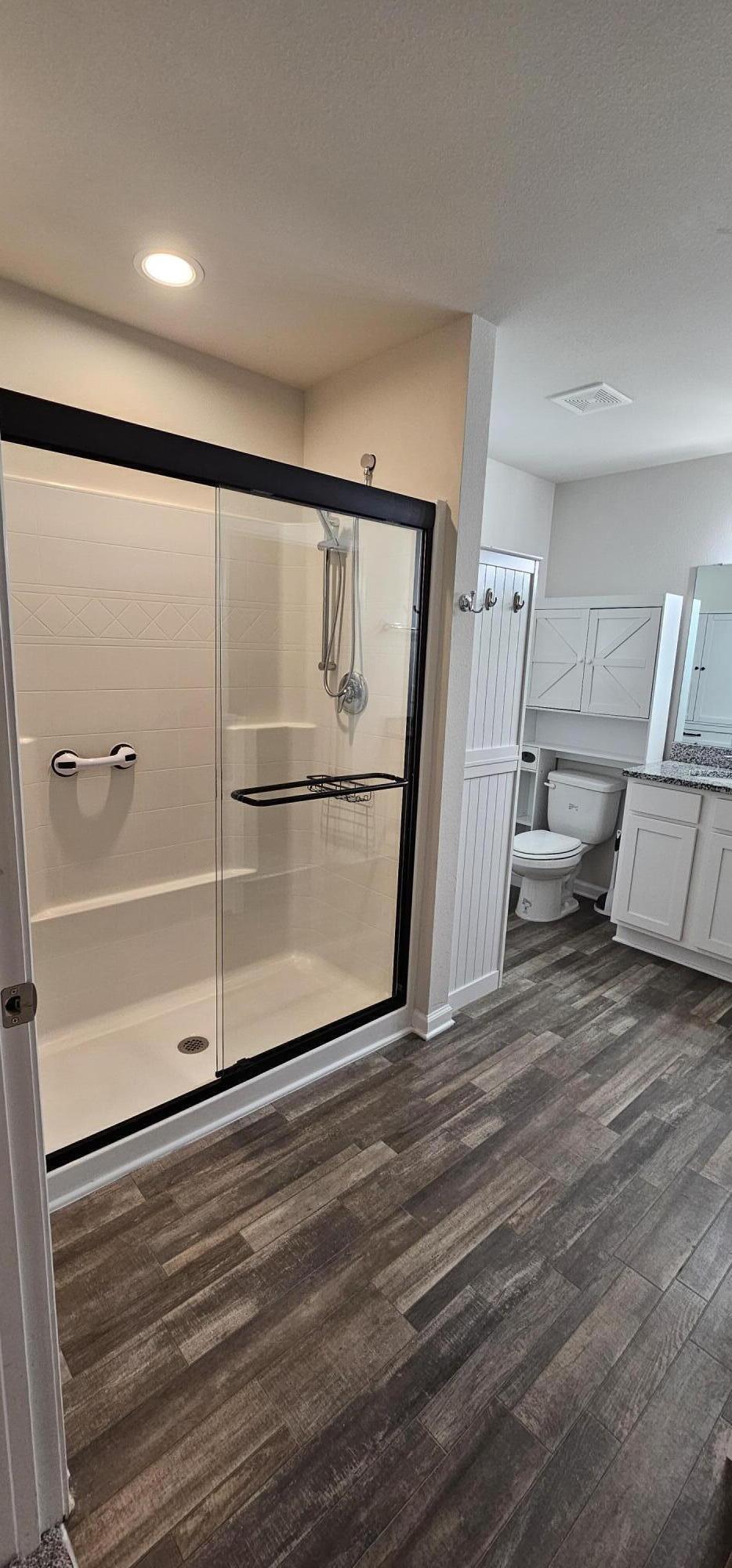 460 Riverwalk Circle Freeport, FL 32439 - Photo 12 of 25 a view of a livingroom with wooden floor