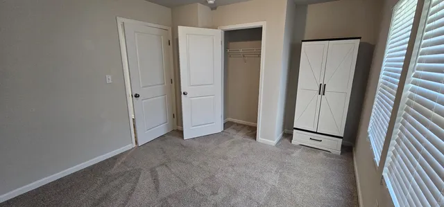 a view of a livingroom with wooden floor