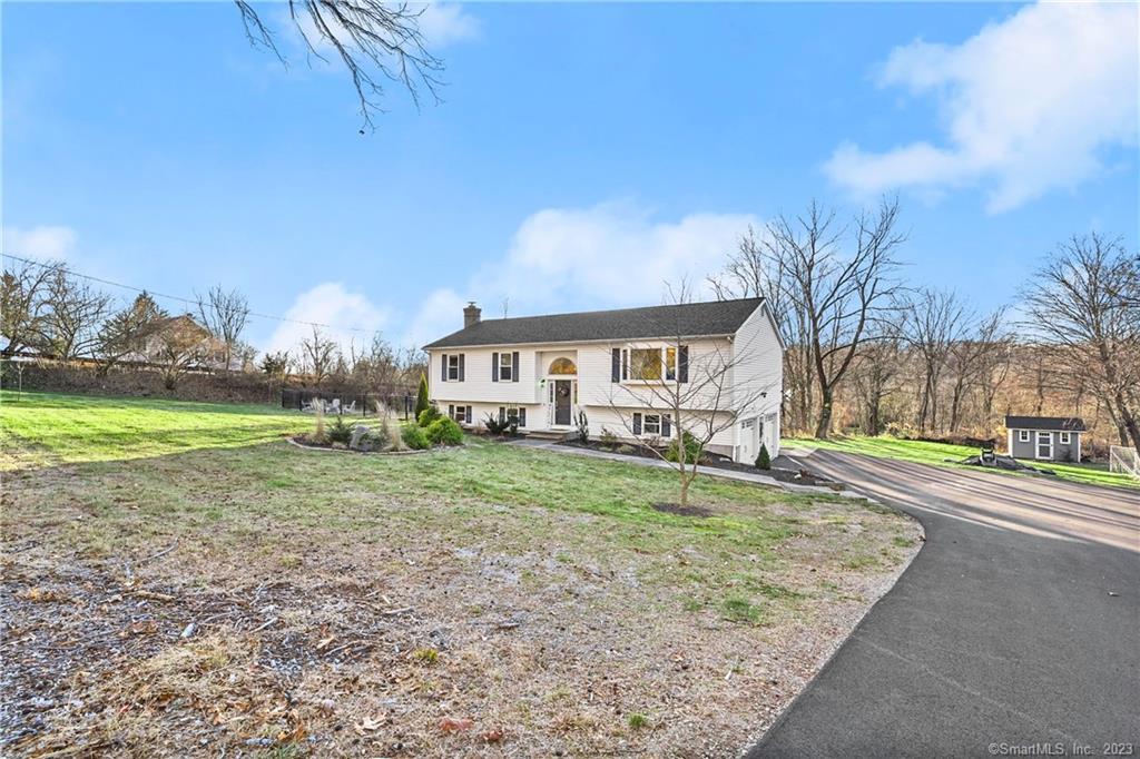 465 Chestnut Tree Hill Road Oxford, CT 06478 - Photo 1 of 1 a view of a house with a yard